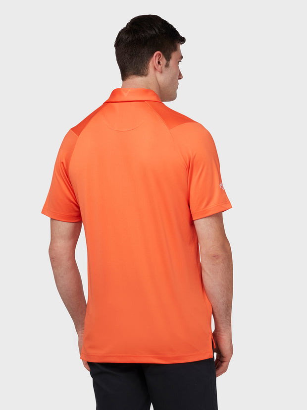 Swing Tech Tour Polo In Tigerlily