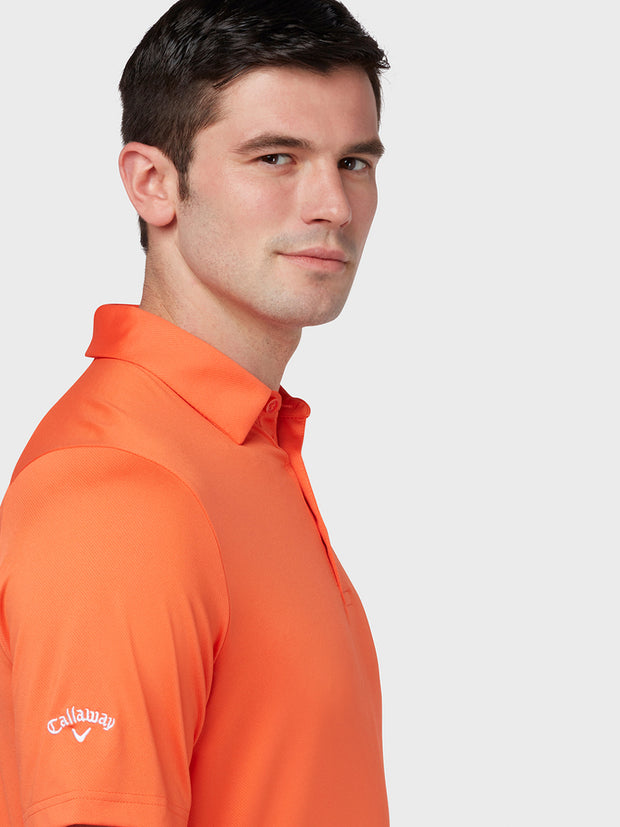 Swing Tech Tour Polo In Tigerlily